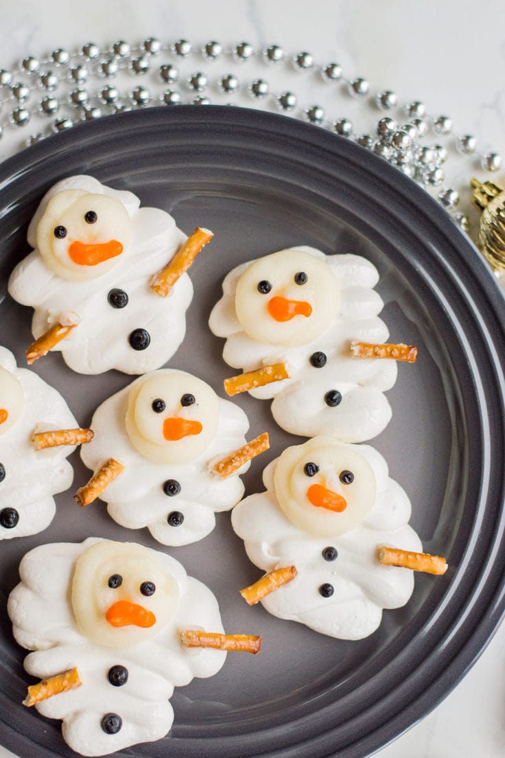 Meringue snowmen cute melting winter cookie.