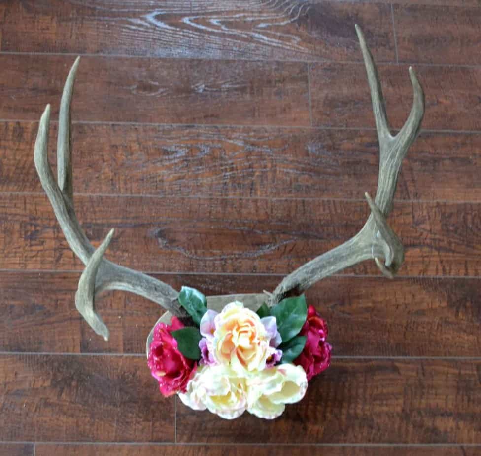 DIY rustic antlers with flowers from Ever After in the Woods.