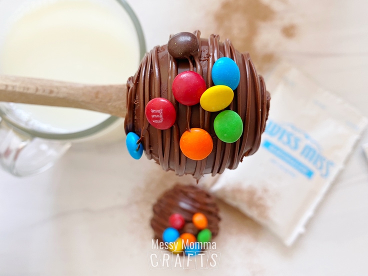 A close-up of an M&M hot cocoa bomb