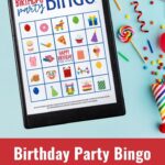 Birthday Party Bingo Board attached to a clipboard on a blue party background.
