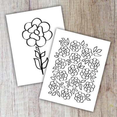 Preview of two flower coloring pages on a wooden background.