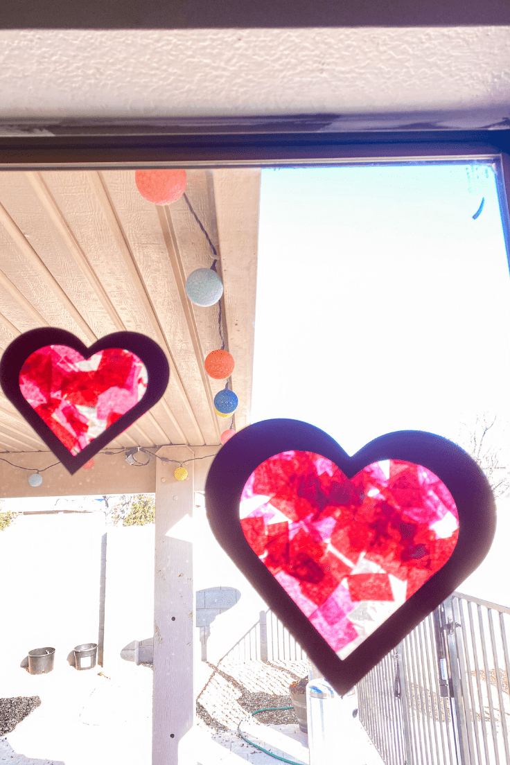 hearts with tissue paper hanging on a window