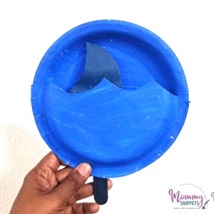 Shark fin paper plate craft for kids.