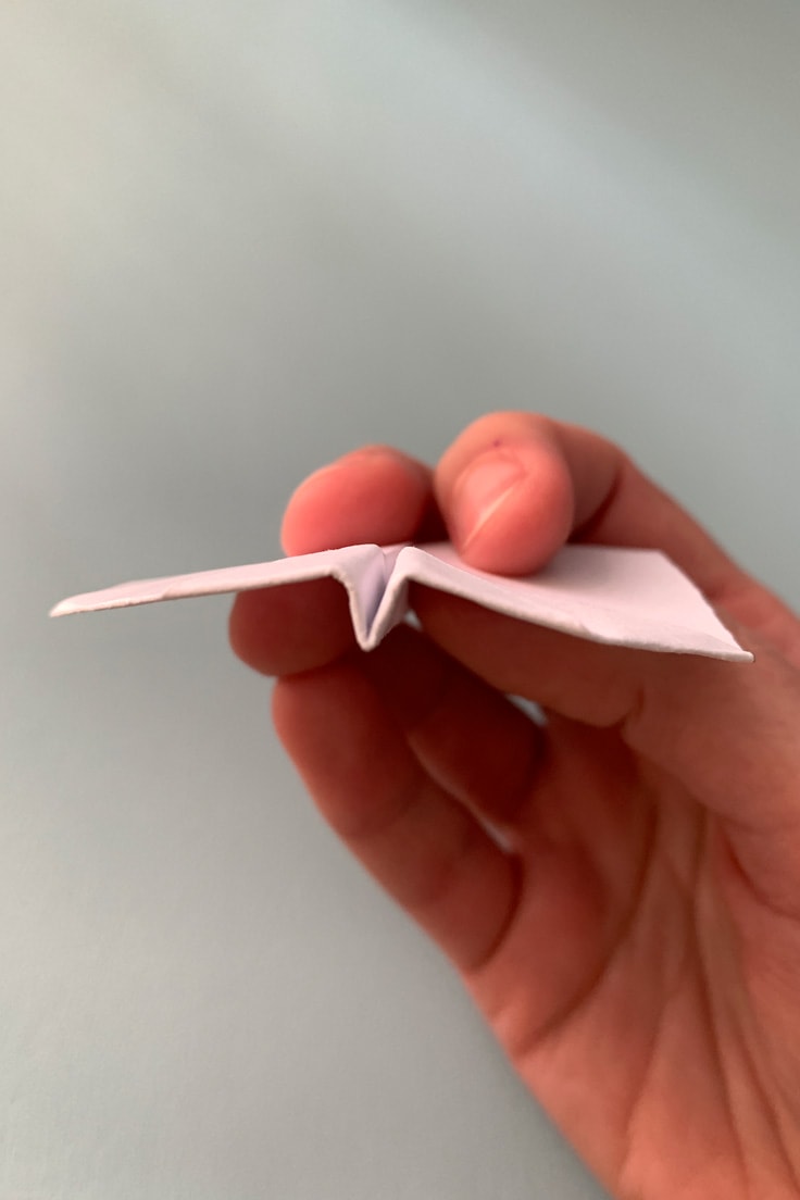 Side view of a folded airplane.