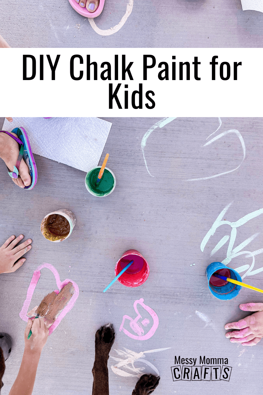 Kids drawing with chalk paint on cement