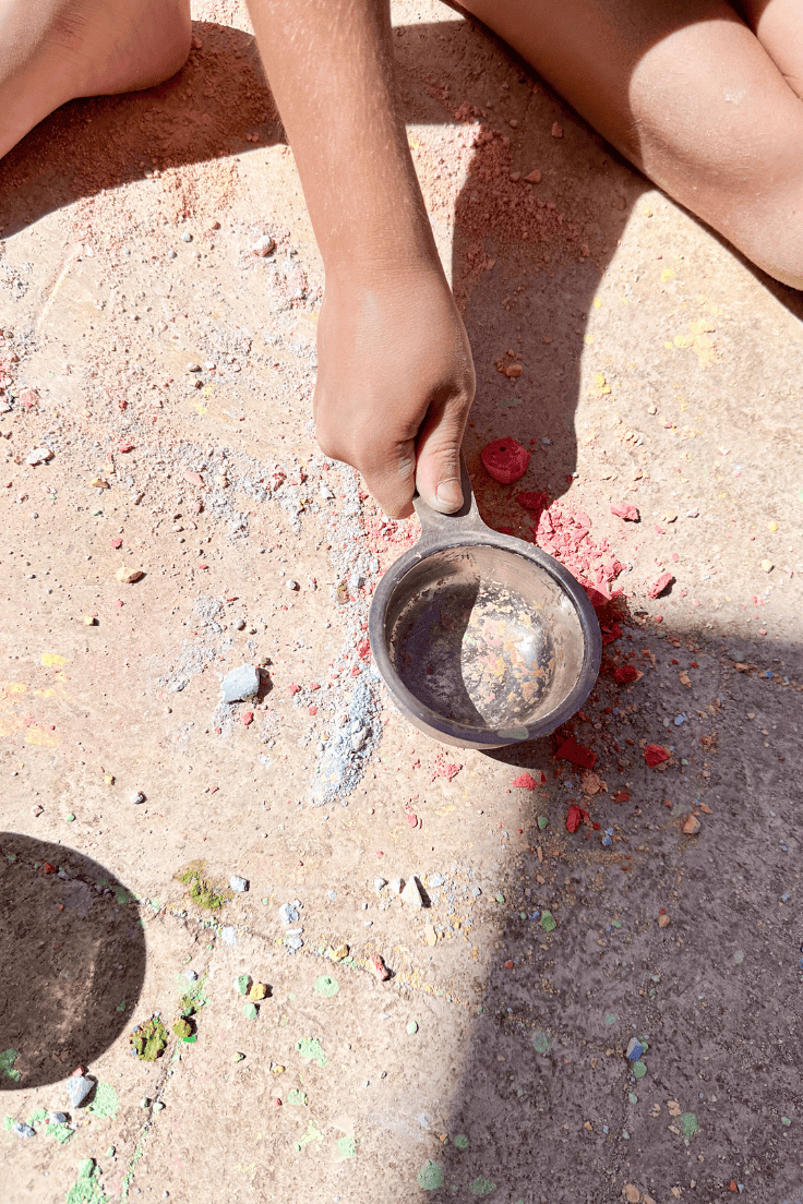 Smashing chalk with stainless steel measuring cups and spoons