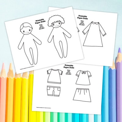 Preview of 3 pages of printable doll designs to color up on top of background with row of colored pencils.