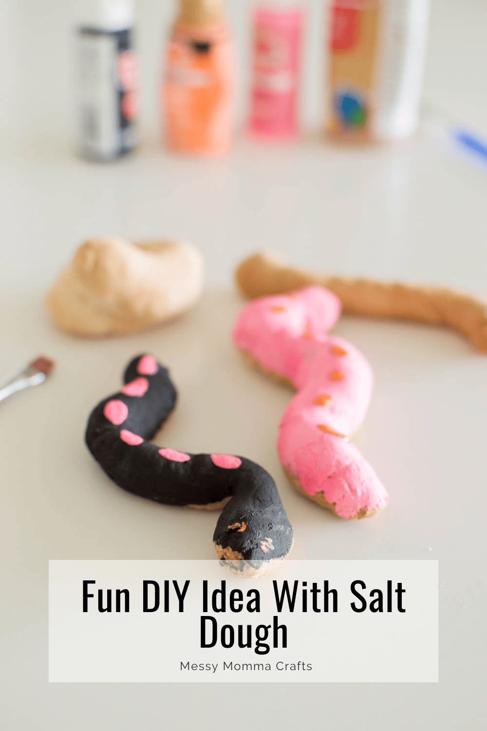 A pink and black snake made with our easy salt dough recipe