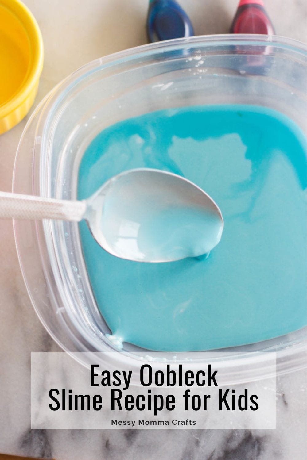 Easy blue oobleck slime recipe for kids in a tub.