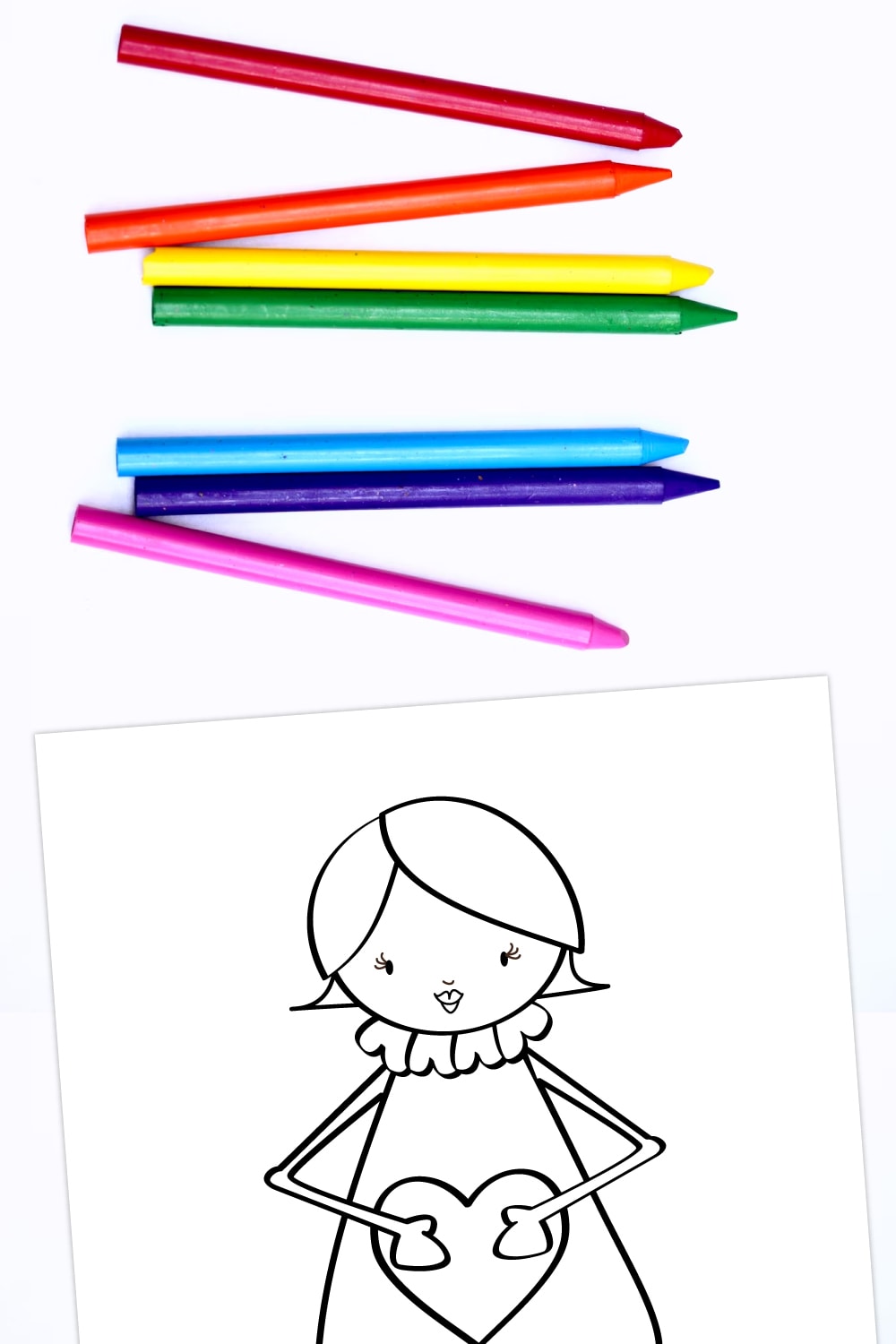 Preview of cute girl coloring page on a white background with various colored crayons on top. 